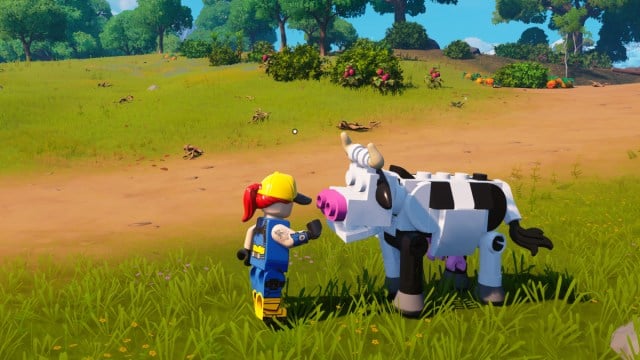 A player petting a Cow in LEGO Fortnite.