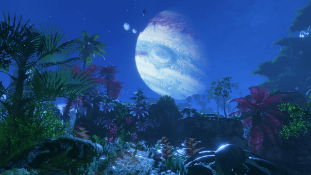 An atmospheric landscape shot of Pandora at night, with a giant planet visible in the sky. From Avatar: Frontiers of Pandora.