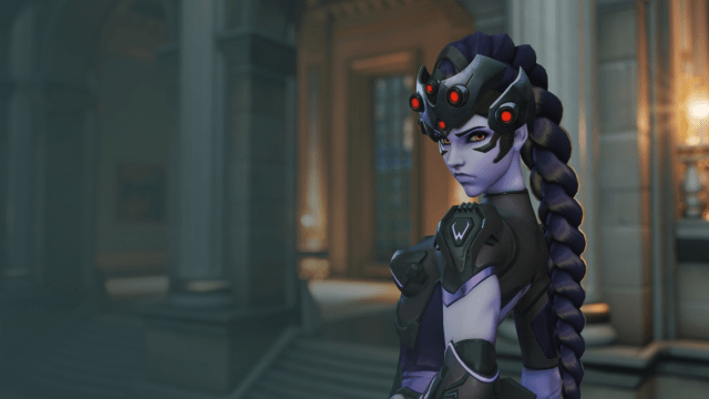 Widowmaker is staring menacingly at the camera.